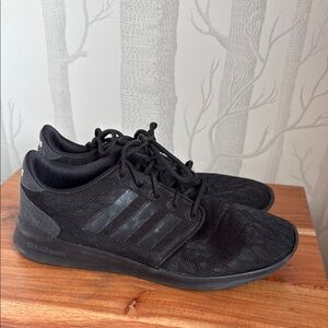 Adidas Black Sneakers with Mesh Upper and Sleek Design